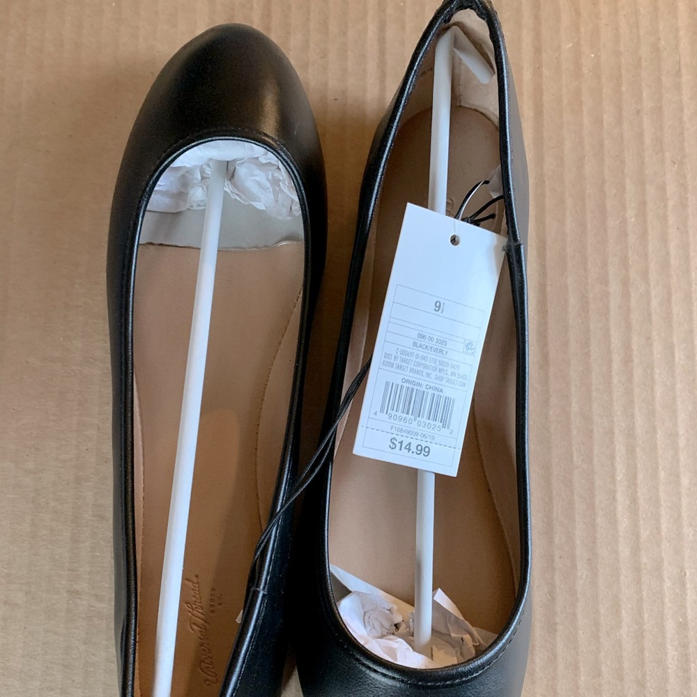 Brand new black flats, never worn, tags still in place also original box